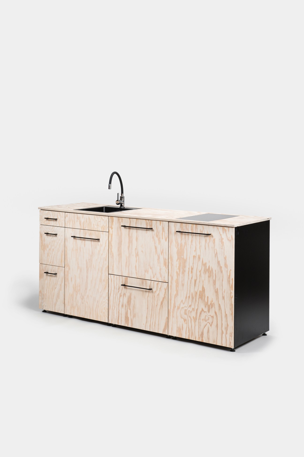 Tinyküche compact kitchenette showing the modular design with integrated appliances