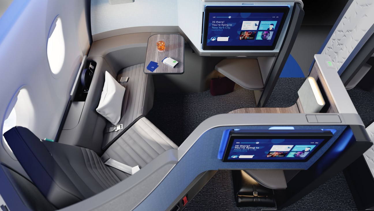 JetBlue Mint Business Class seat interior with entertainment screen and premium cabin layout