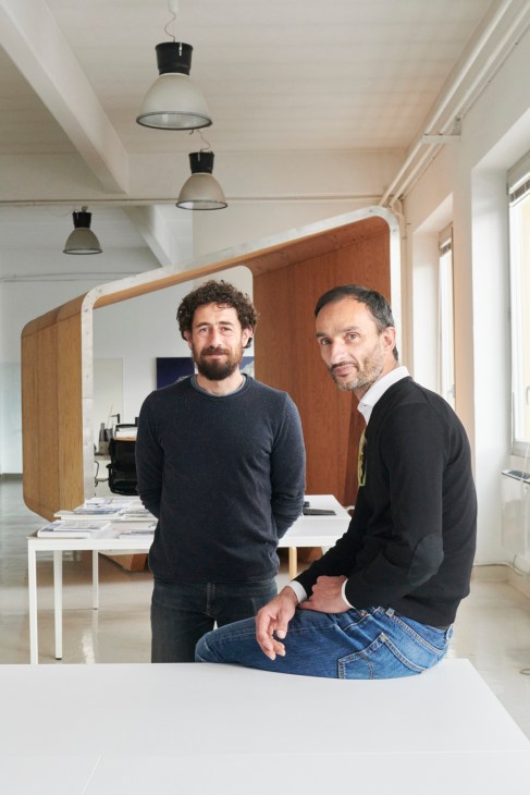 Luca Gentilcore and Stefano Testa, co-founders of Leap Factory, pose in their Turin office.