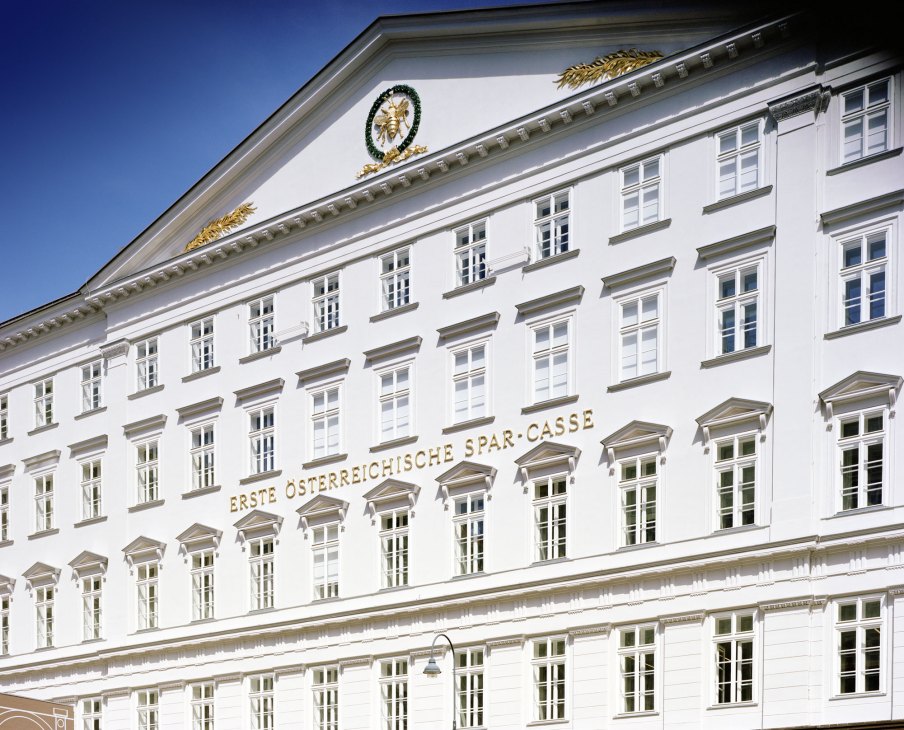 White neoclassical building exterior with gold lettering reading ERSTE ÖSTERREICHISCHE SPAR-CASSE