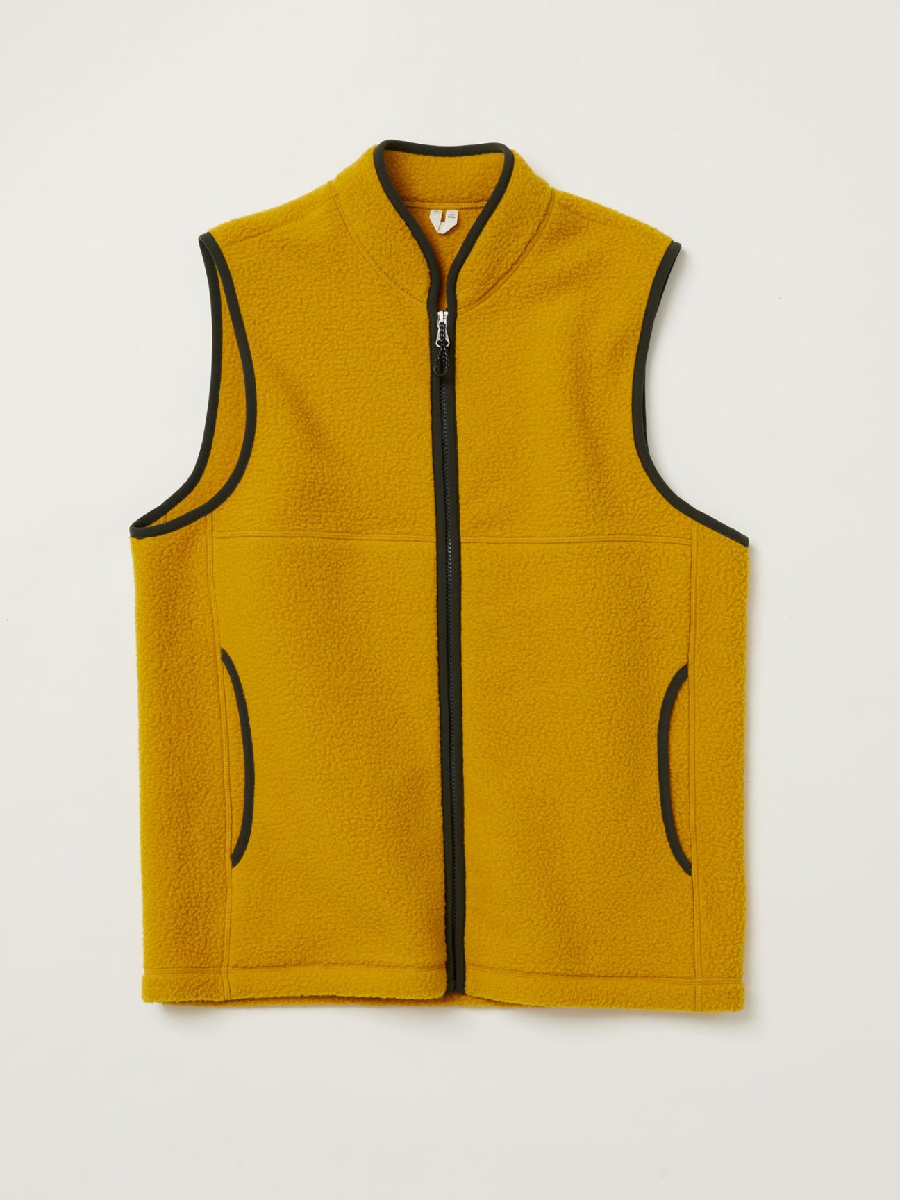 Yellow fleece vest with black trim from Mr Porter x Arket collaboration