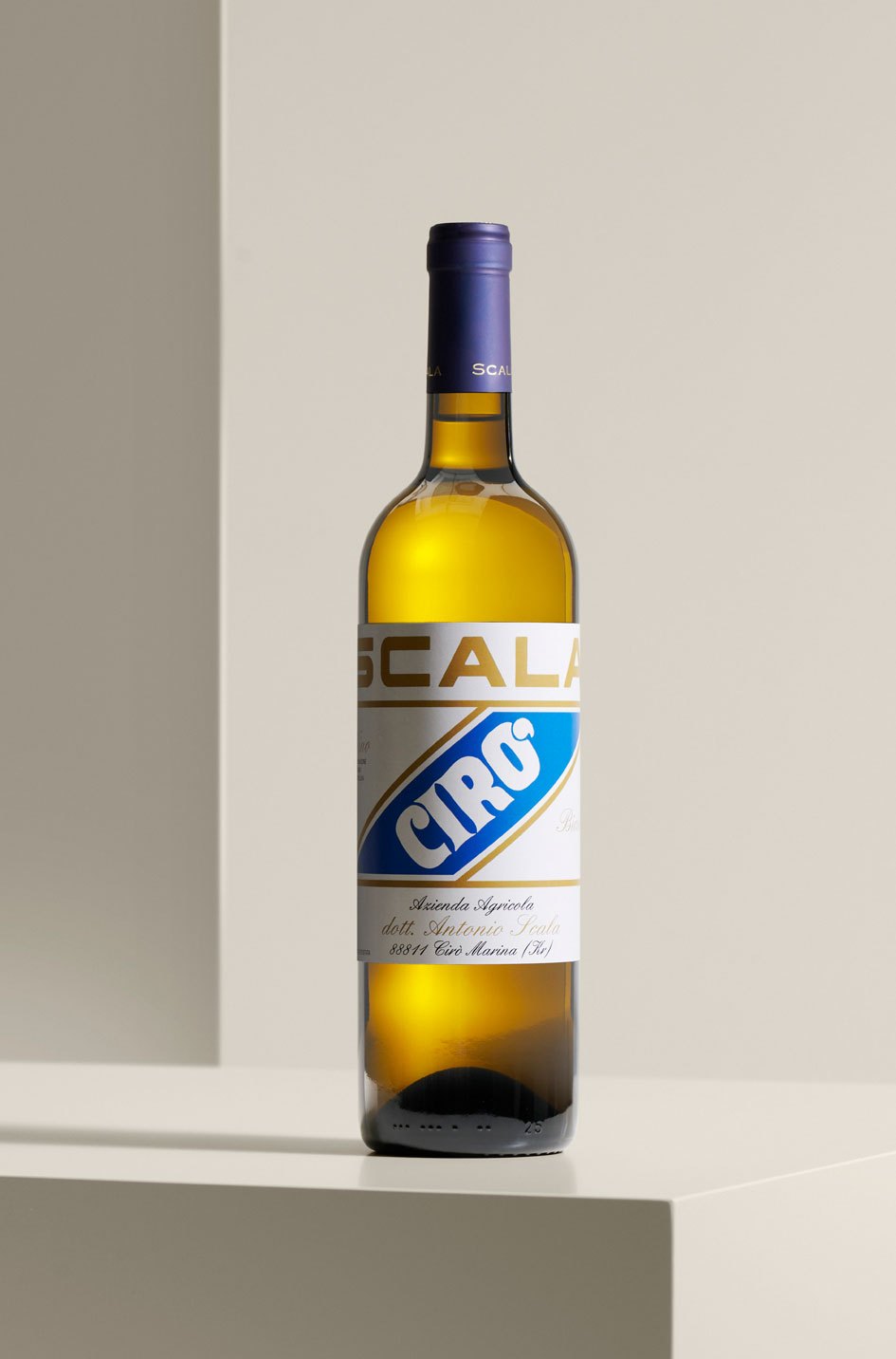 Scala Cirò Bianco wine bottle with vintage blue and gold label design