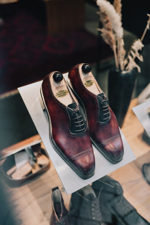 Interior of Vass shoes showing display of handcrafted leather shoes