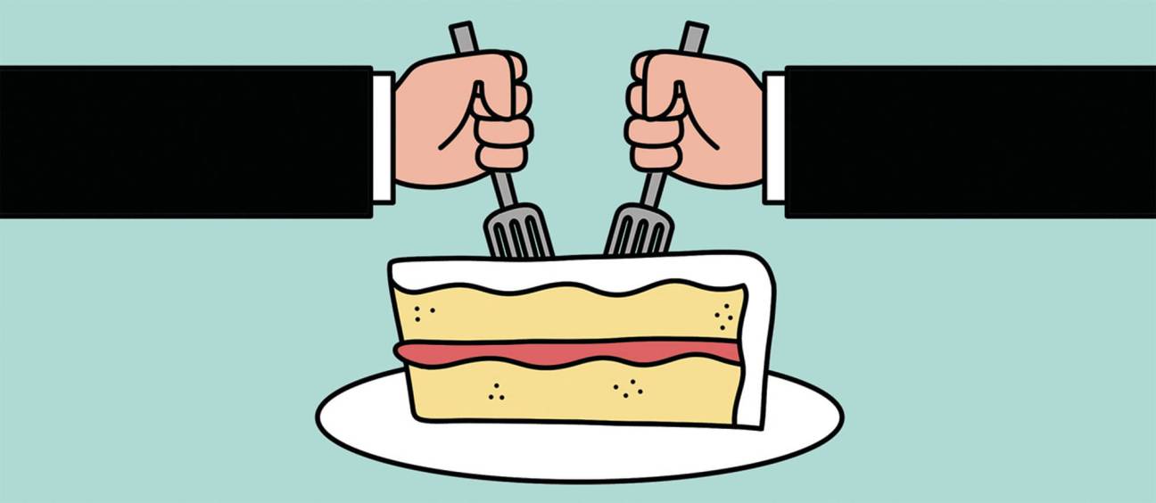 Two hands in business suits holding forks approaching a slice of layered cake on a white plate