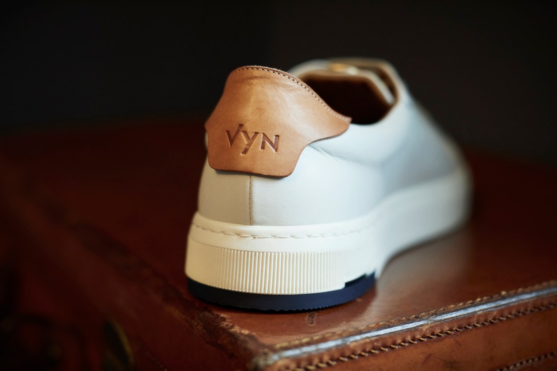 VYN sneakers showing the replaceable heel components in different colors