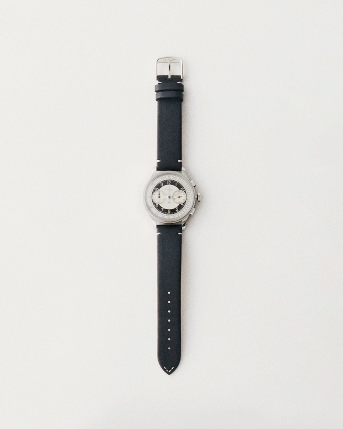 Longines Heritage Classic Tuxedo watch with white dial and black leather strap