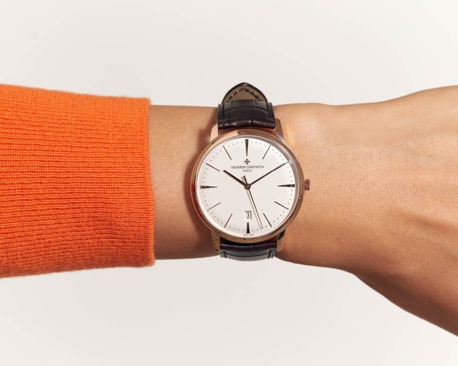 Vacheron Constantin Patrimony Self-Winding watch with white dial and brown leather strap worn on wrist