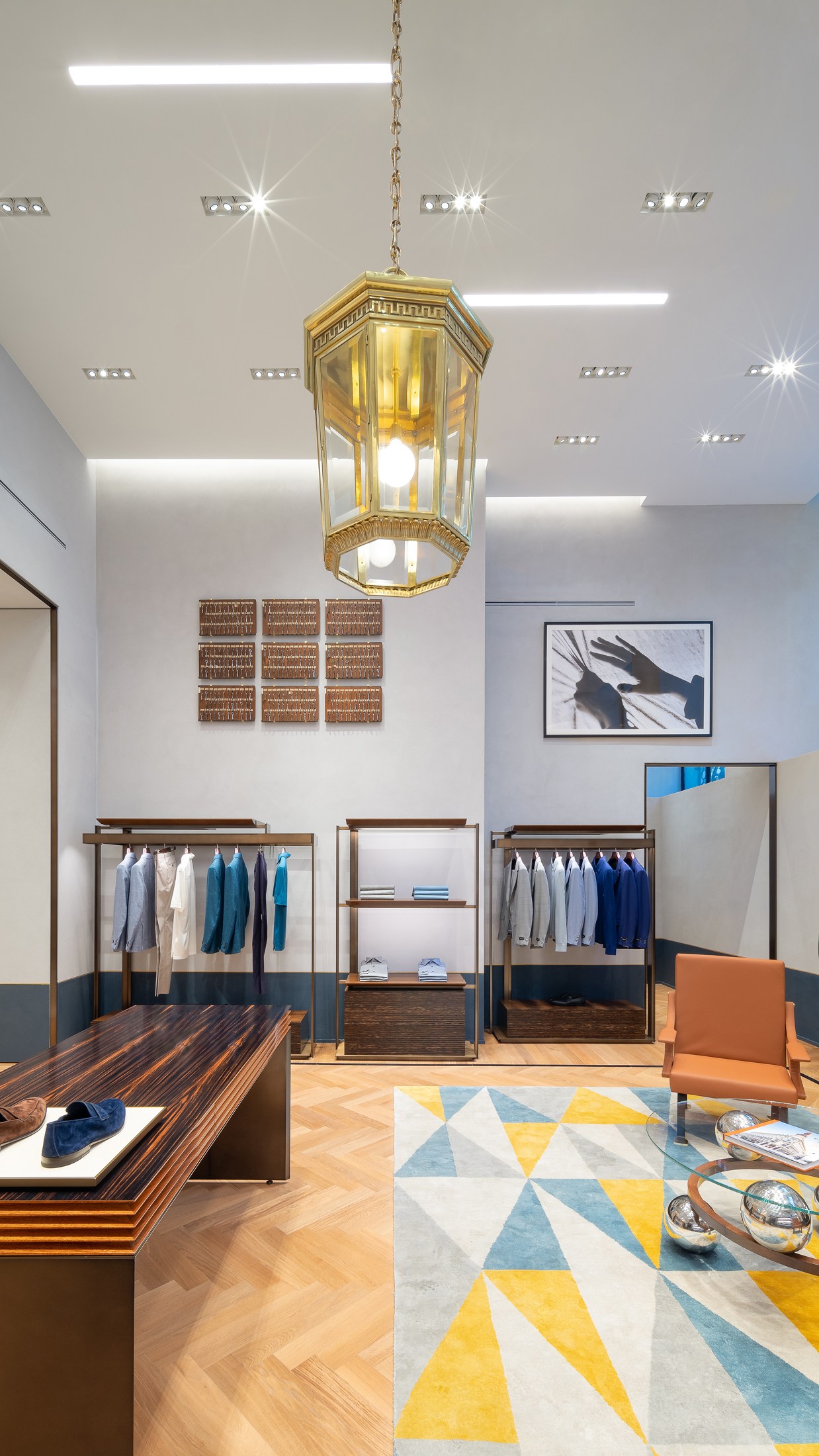 Modern Zegna boutique interior with contemporary design elements and historic banking features in Madrid