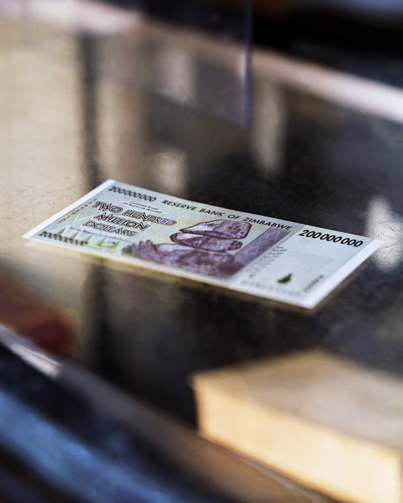 Zimbabwean banknote showing 200 million dollar denomination from the hyperinflation period