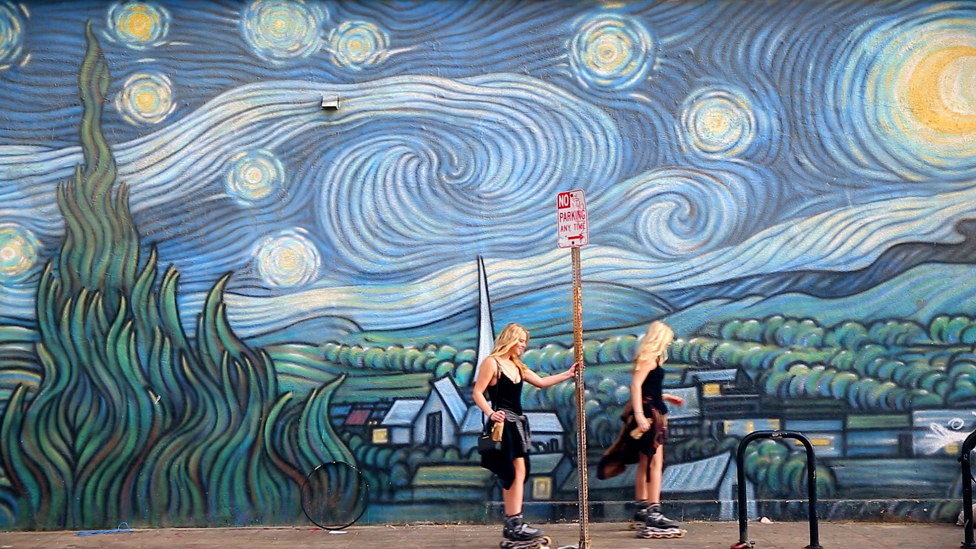 Two women skating in Los Angeles.