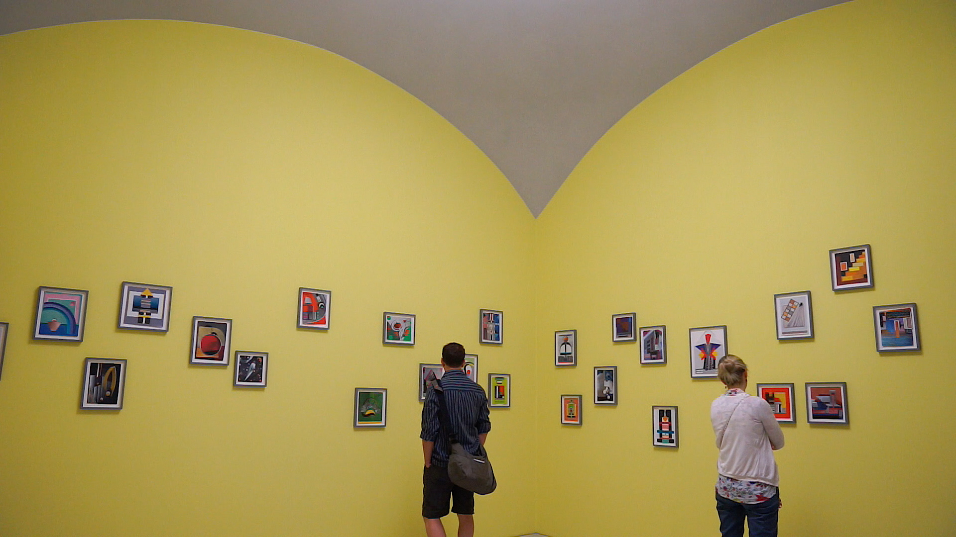 People looking in a modern art gallery