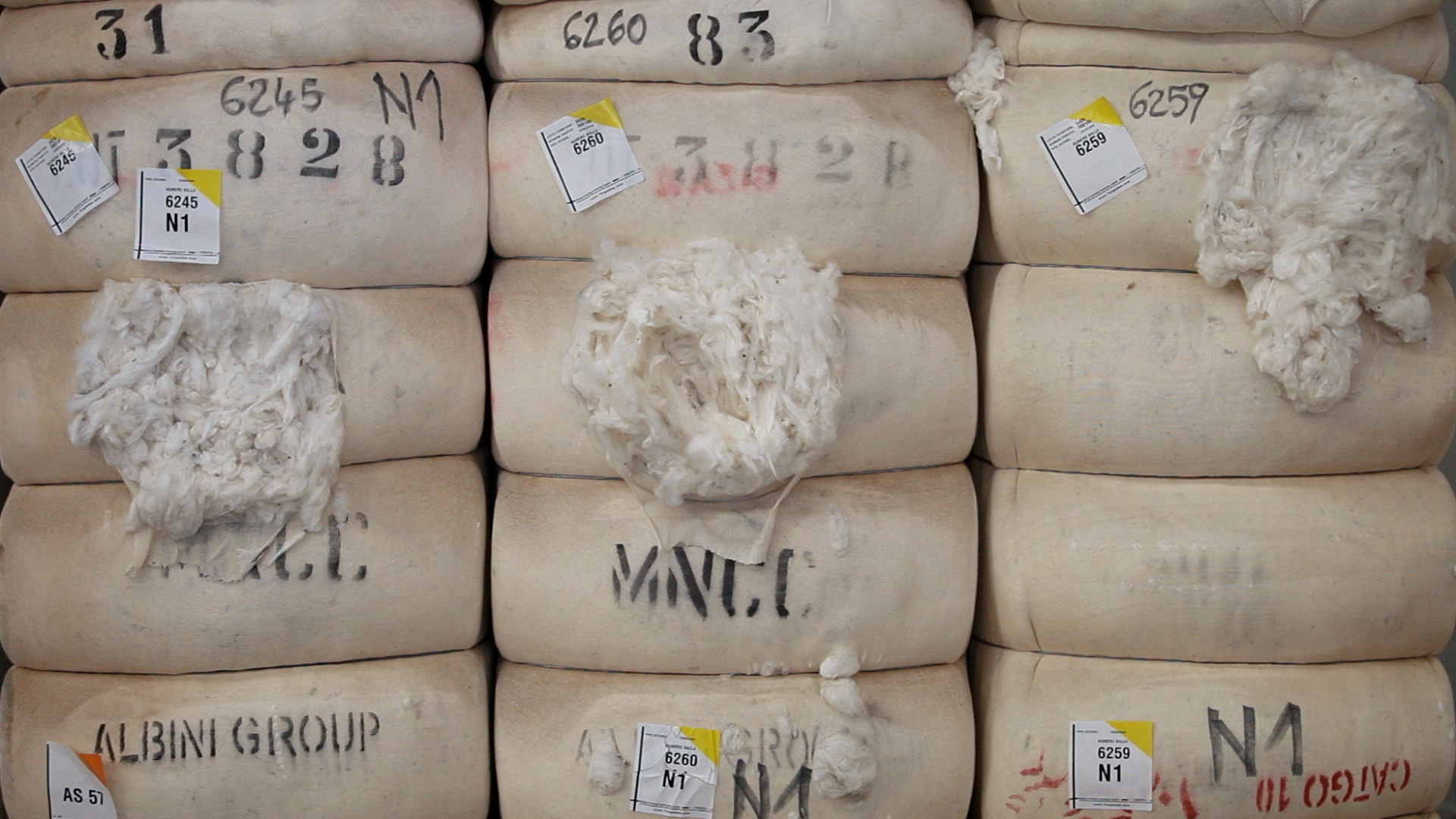 Bags with raw cotton.