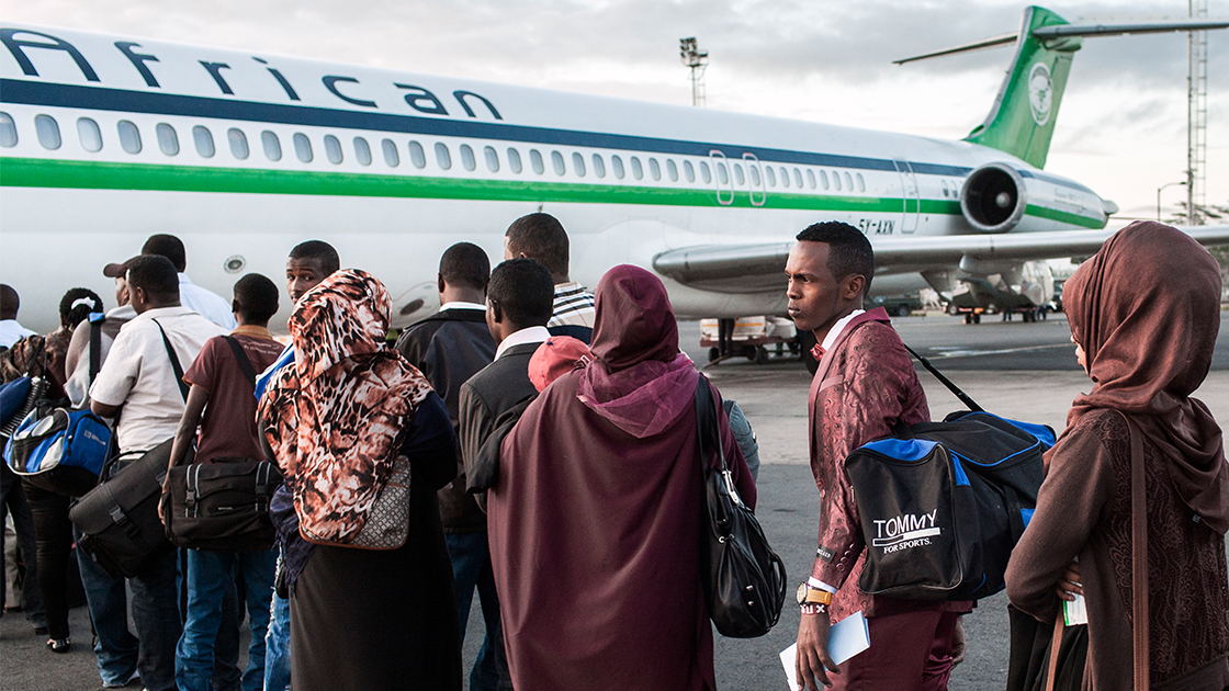People boarding a plane.