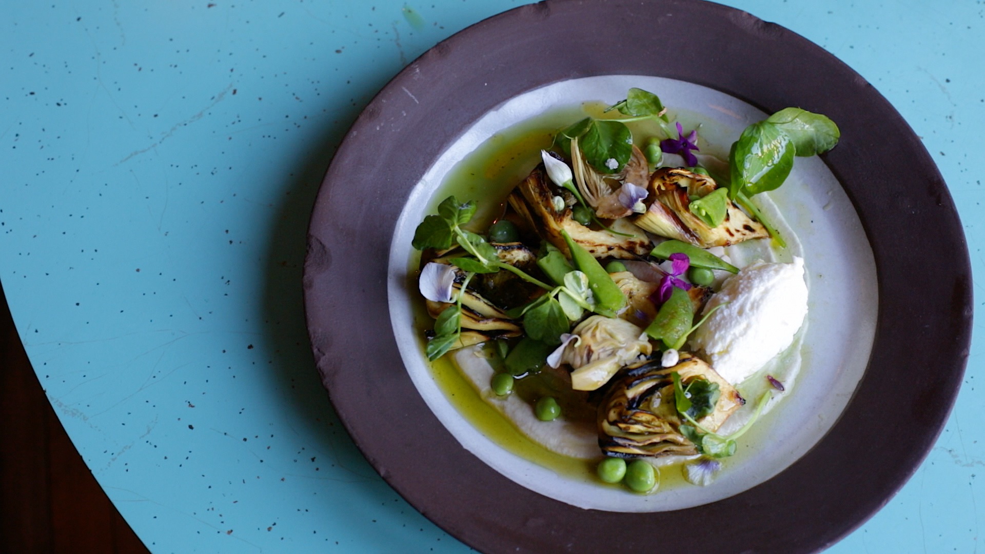 Salad served on a plate.