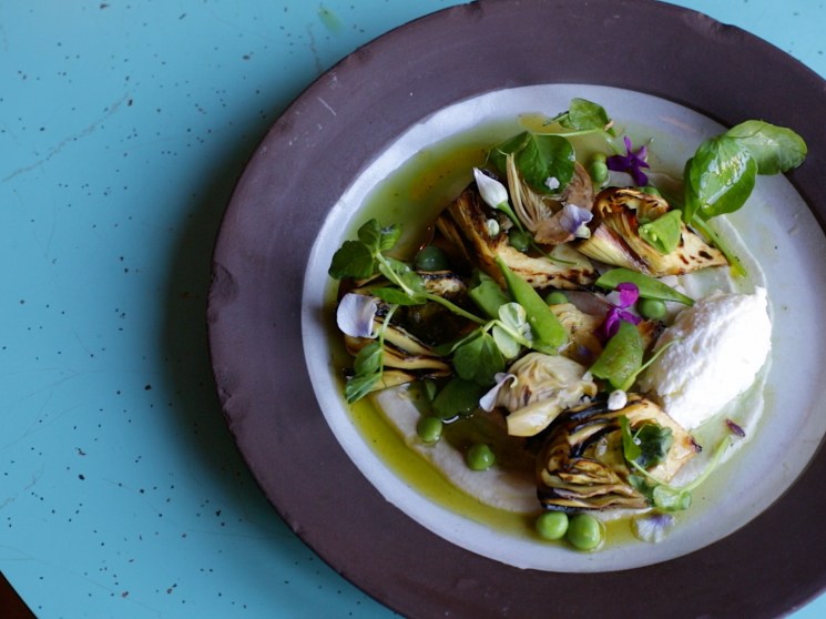 Salad served on a plate.