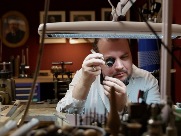 Jeweller working in his workshop.