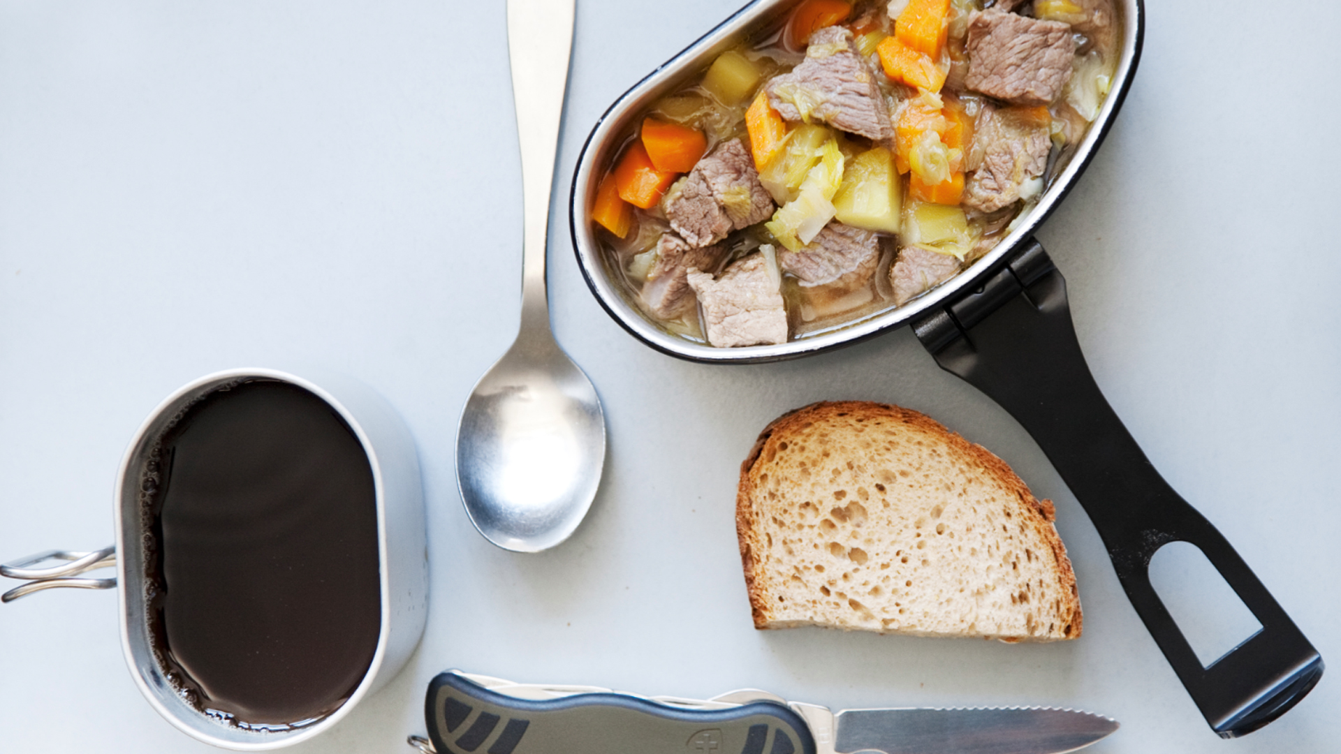 meat stew, gravy and cutlery