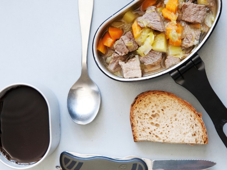 meat stew, gravy and cutlery