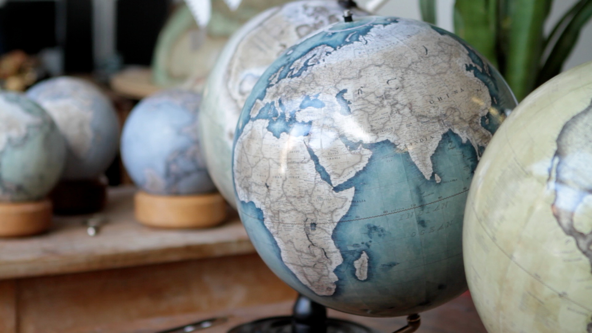 Handmade globes in a workshop.