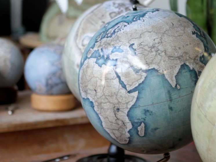 Handmade globes in a workshop.
