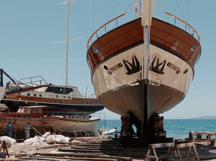 A boat in a dockyard.