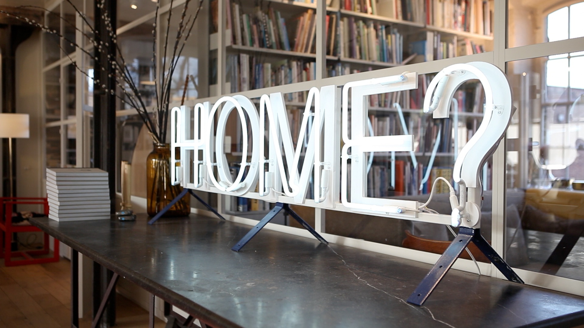 An illuminated sign in an office.