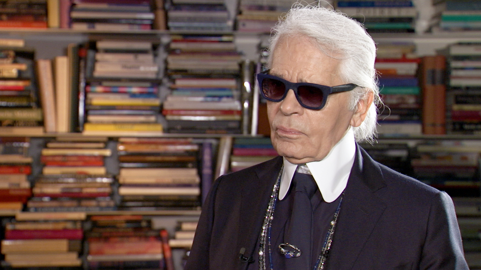 Karl Lagerfeld being interviewed.