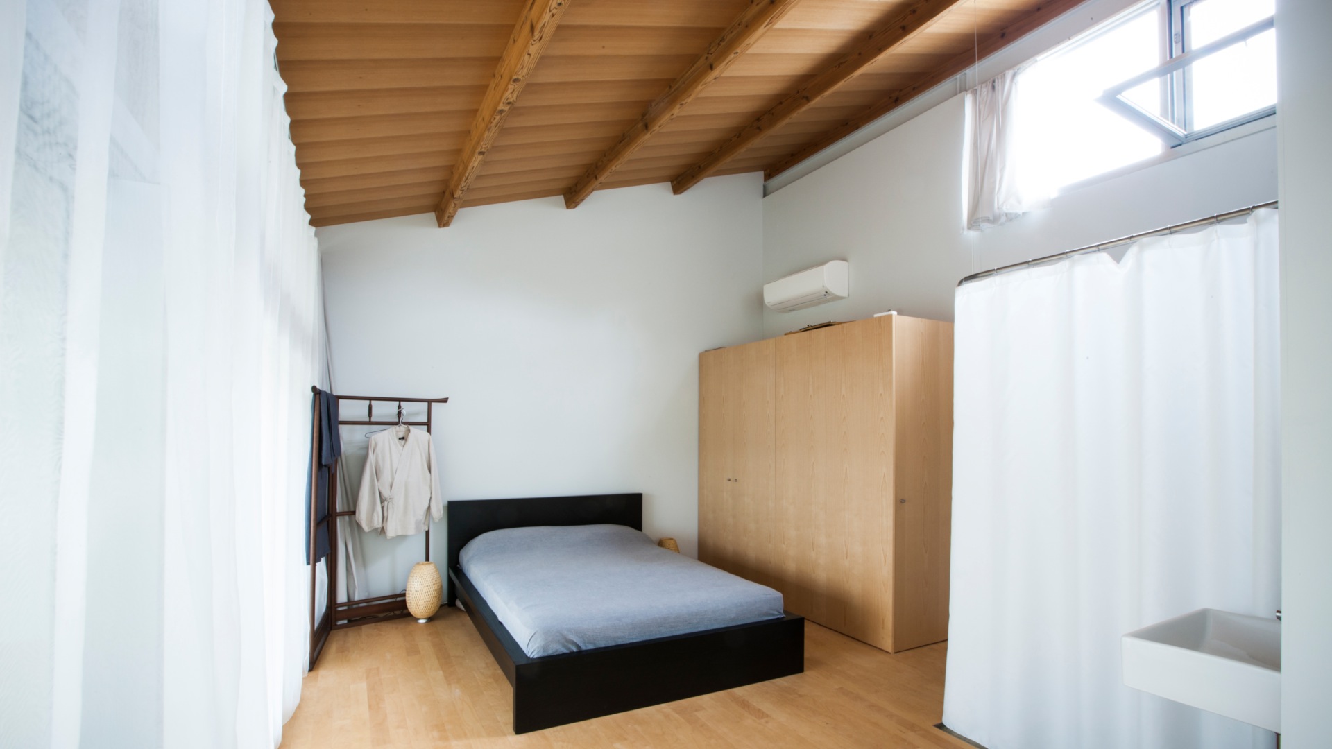 A bedroom at Nishinoyama House.