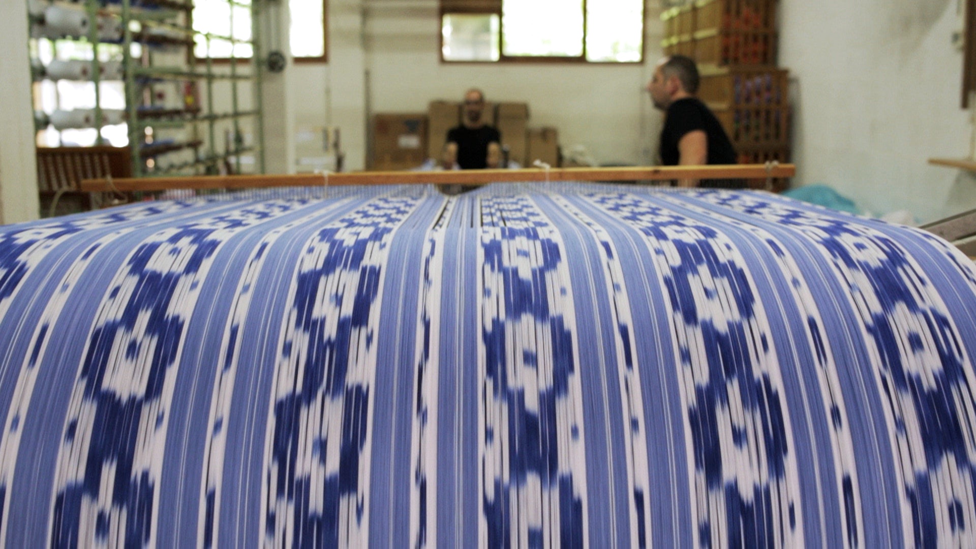 A fabric being made.