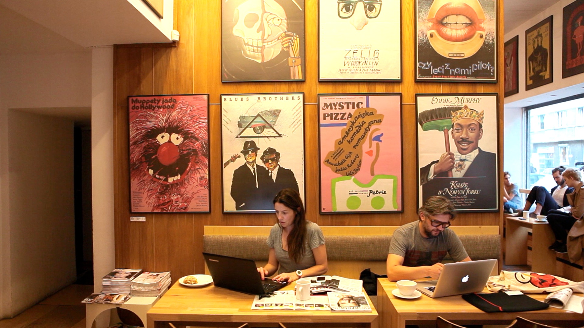 People working at a cafe in Mokotow.