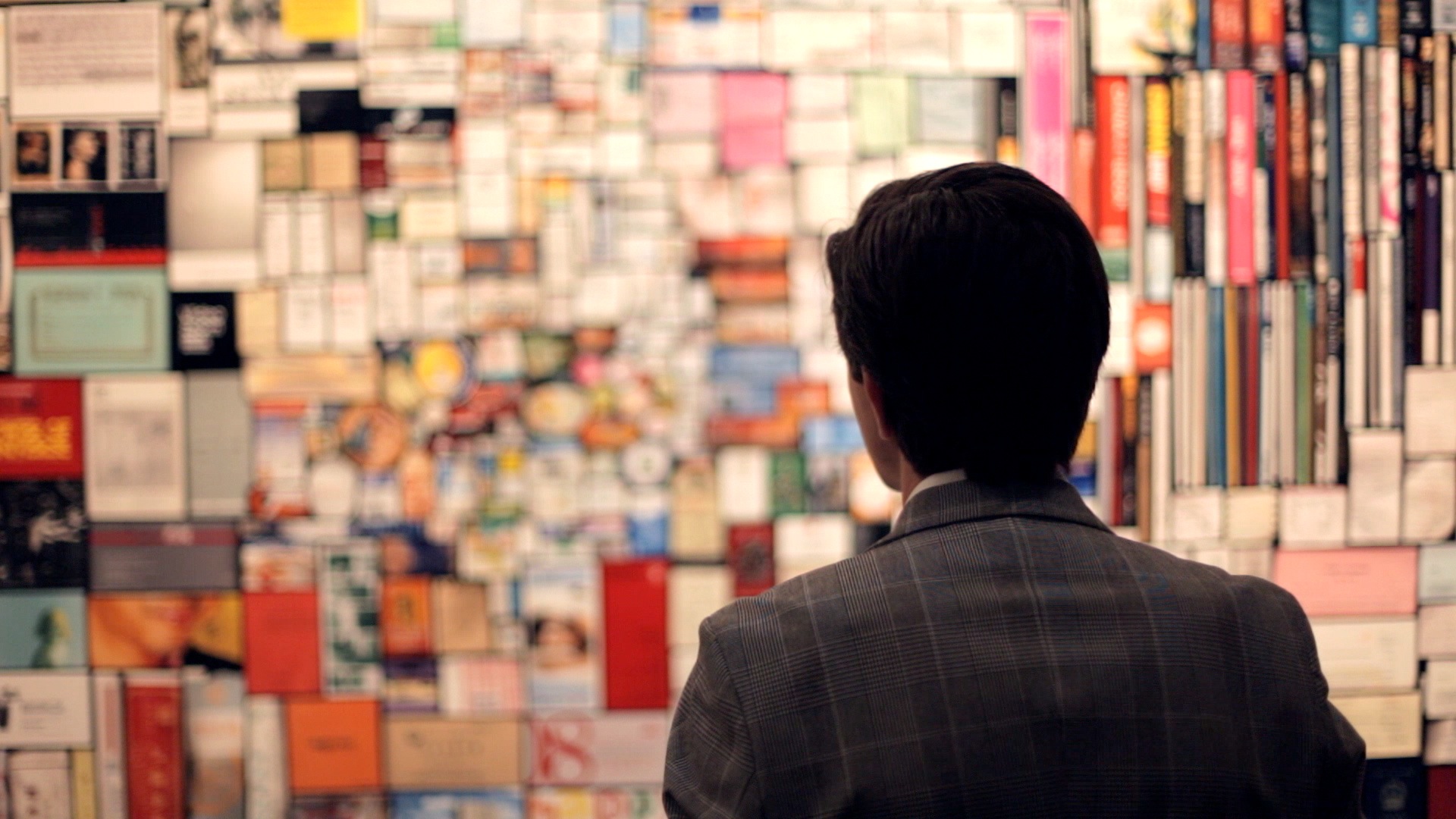 A man observing a work of art.