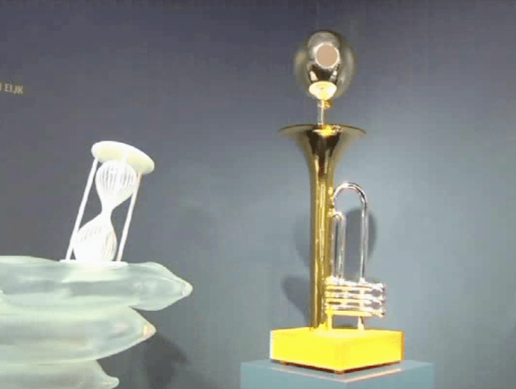 toy hourglass and toy trumpet
