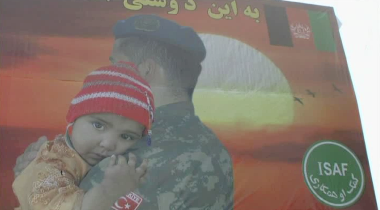 soldier hugging child