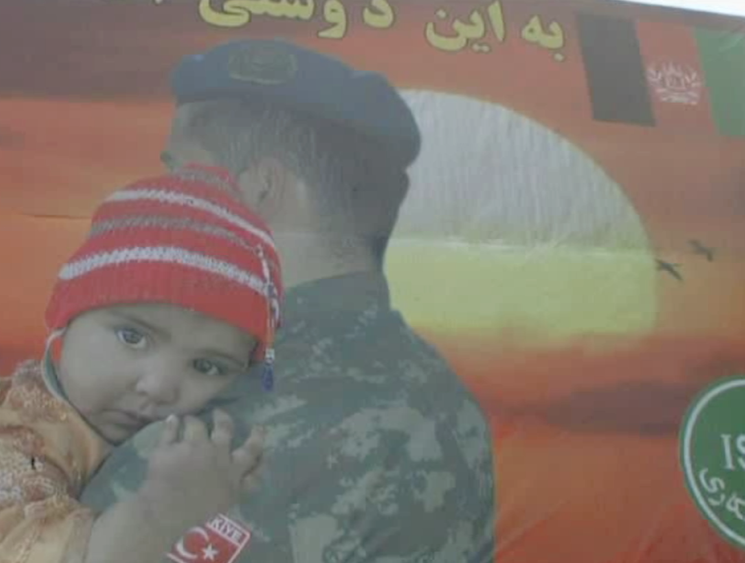 soldier hugging child