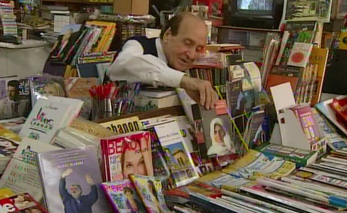 man in book shop