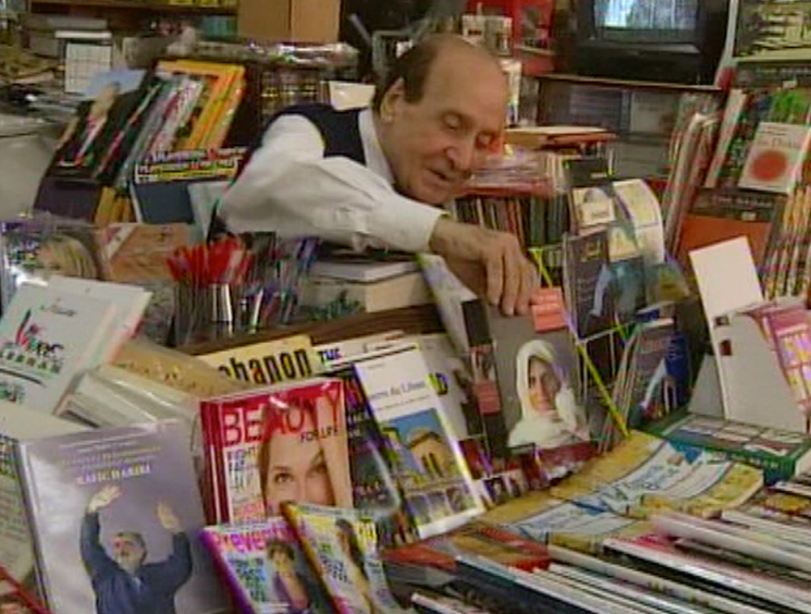 man in book shop
