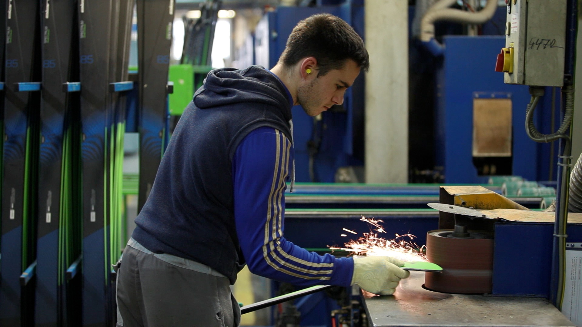 A man making skis by hand.