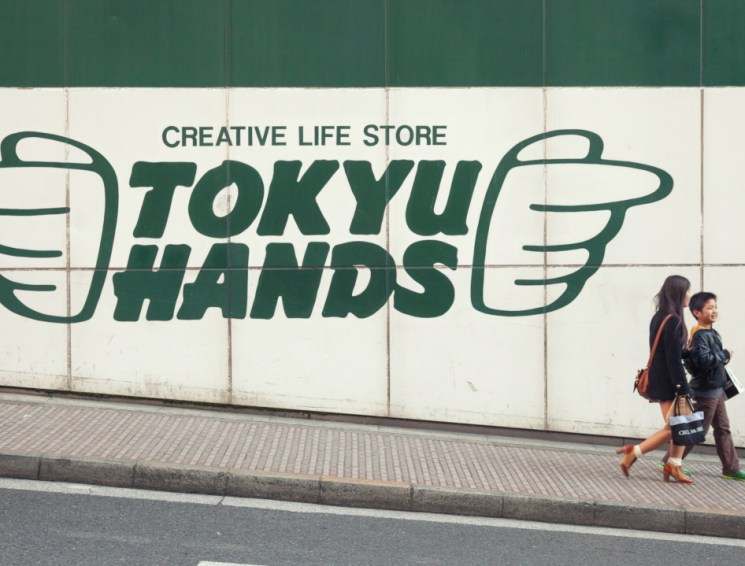 woman, child and street advertisement