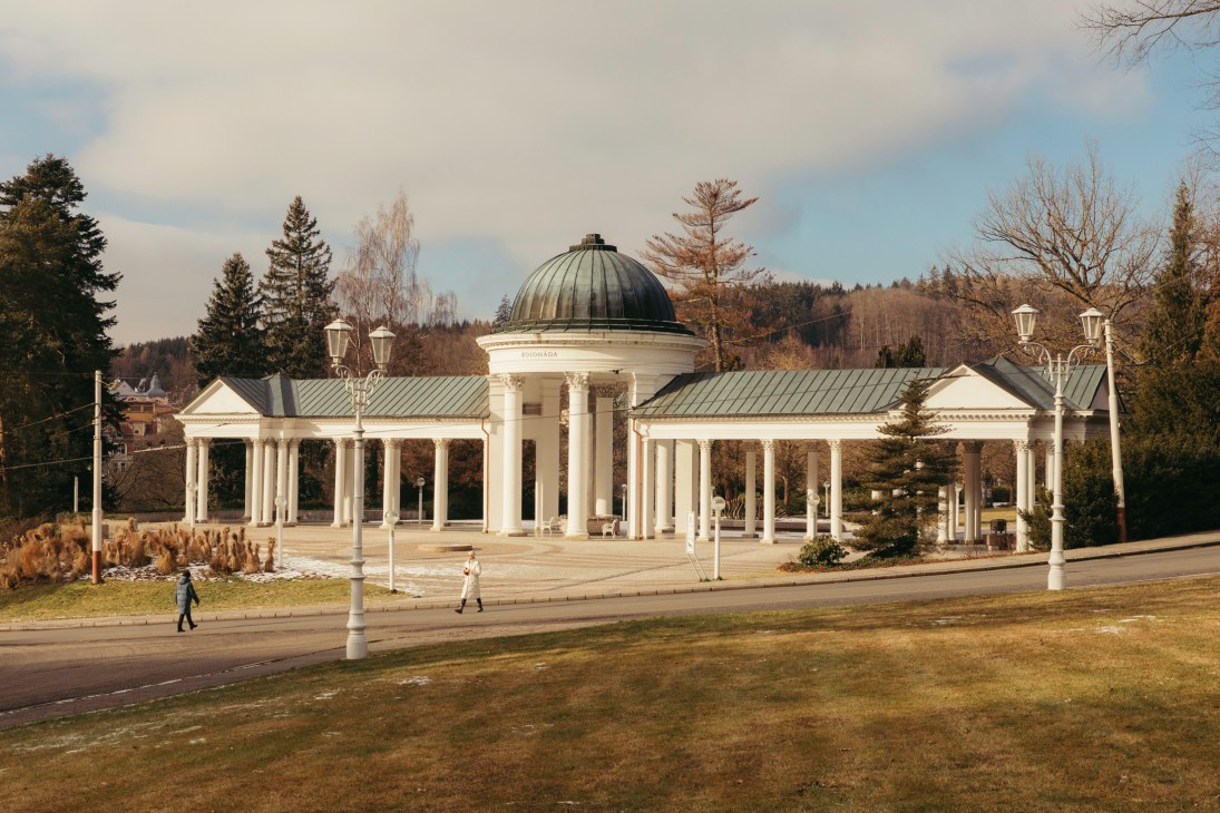 Caroline's spring colonnade with neoclassical white columns and green dome in Marienbad