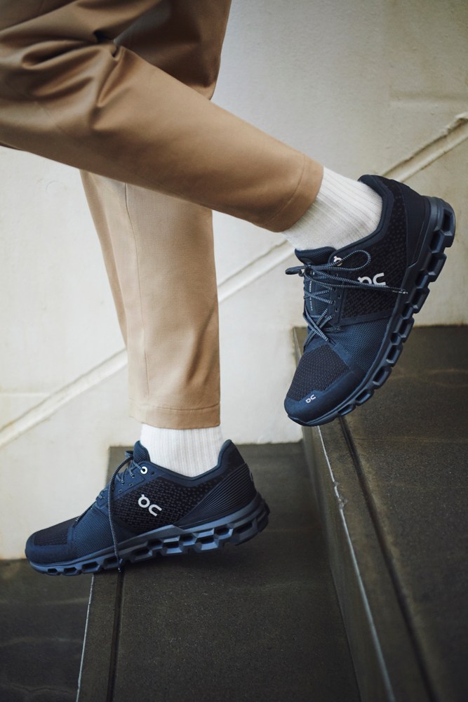 Athleisure look with modern trousers and performance trainers