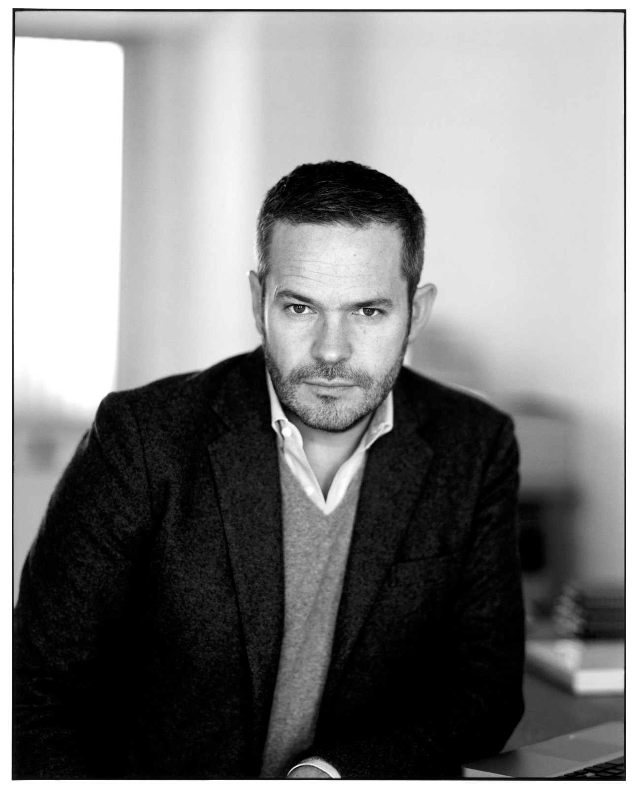 Black and white portrait photograph of Tyler Brûlé, Monocle editor in chief.
