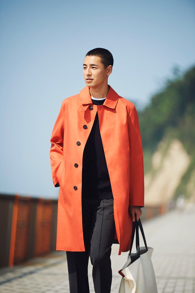 Elegant layered coat look with luxury accessories