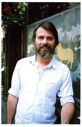 Cathal McAteer, owner of Folk Clothing, standing in front of his store on Lamb's Conduit Street.