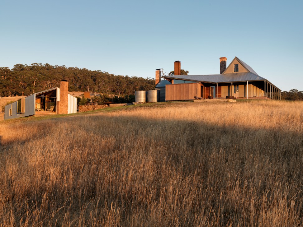 Captain Kelly's Cottage and Shearing Quarters on Bruny Island overlooking grassland and bay.