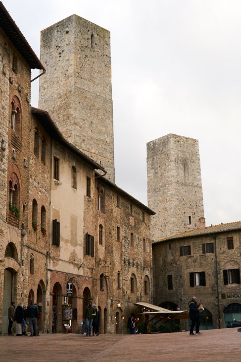 Medieval towers and stone buildings in the historic town of San Gimignano, Tuscany.