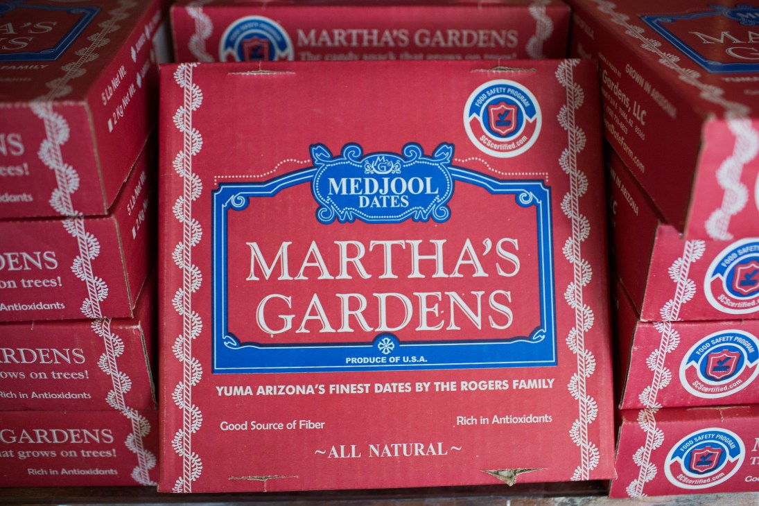 Martha's Gardens medjool date packaging in red with blue labeling from Yuma, Arizona.