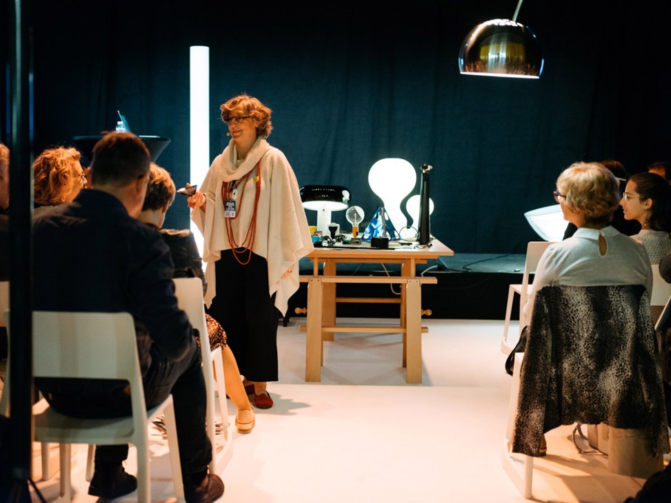 Giovanna Castiglioni speaking at a Flos lighting presentation at Biennale Interieur design fair.