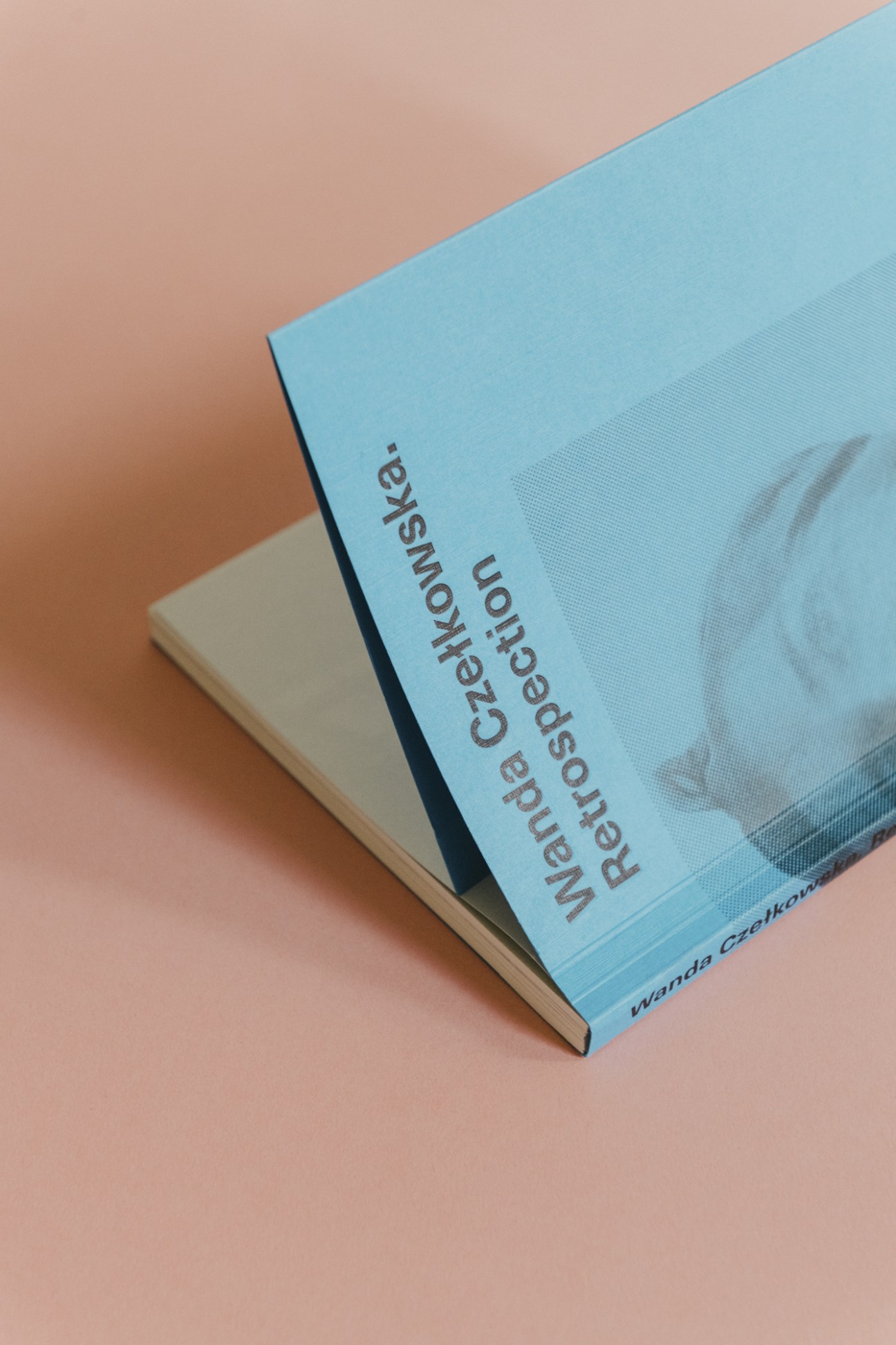 Light blue book cover titled 'Wanda Czekońska Retrospection' designed by Full Metal Jacket