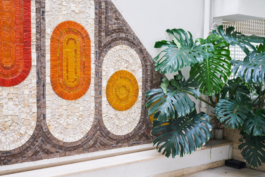 Decorative mosaic tile artwork with geometric patterns at Mas de Tanit