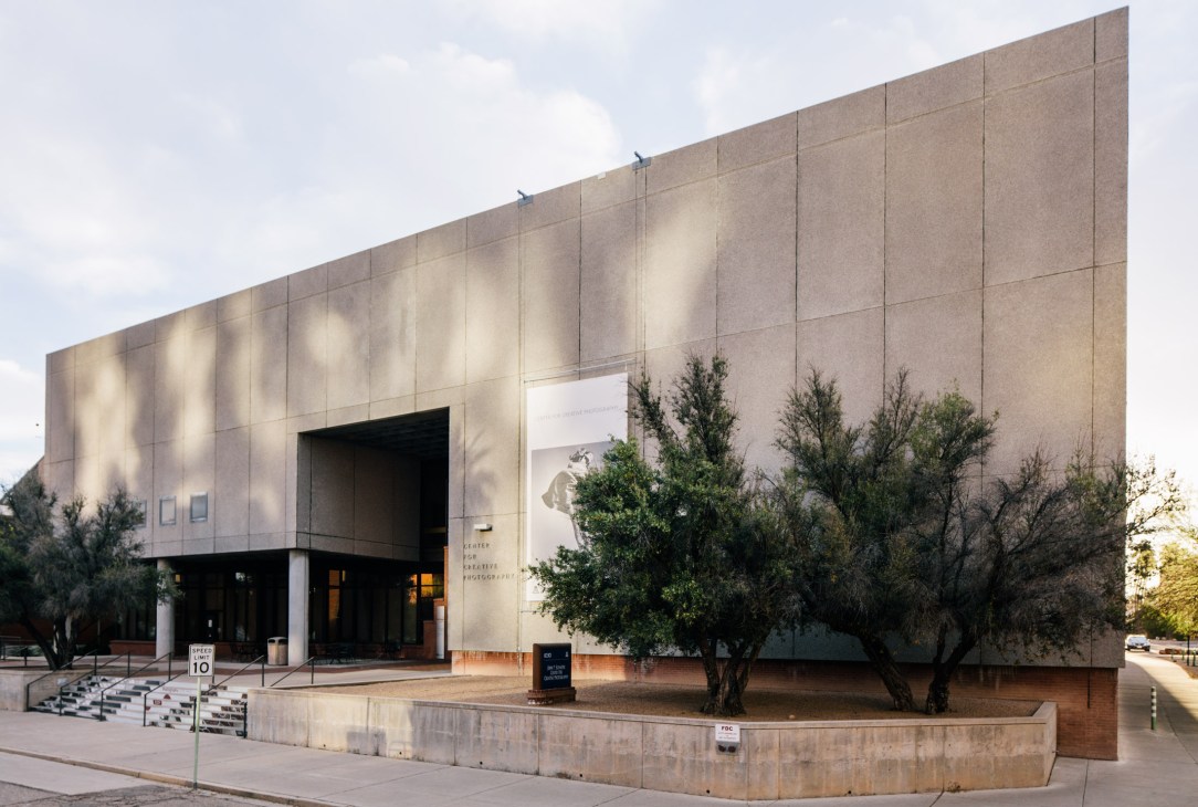 Center for Creative Photography building with modernist concrete facade and desert landscaping in Tucson.